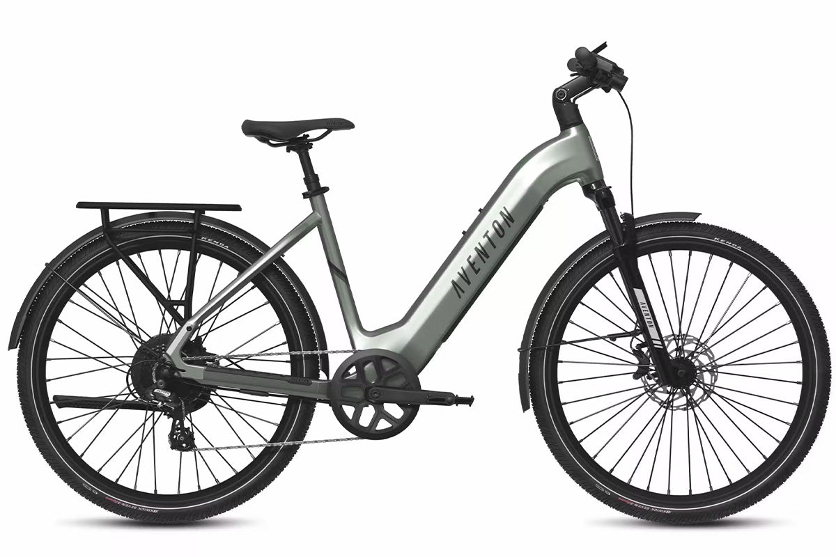 Aventon Level 3 ST step-through commuter eBike parked near a cityscape.