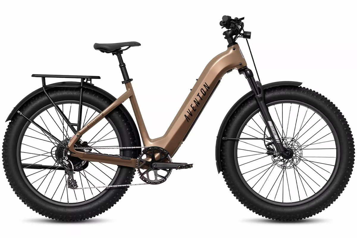 Aventon Aventure 3 ST step-through off-road eBike parked on a dirt road.